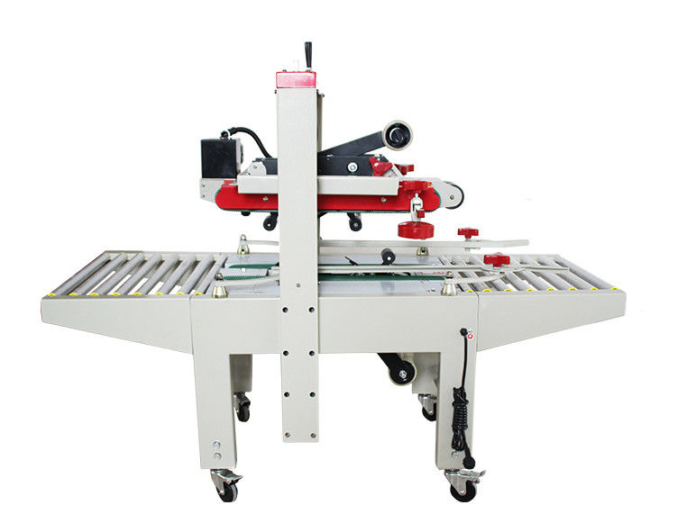 Fxj-6050 υψηλής ταχύτητας ρυθμιζόμενη κορυφαία κάτω ταινία ηλεκτρική σταθερή αυτόματη κουτιά κουτιά σφραγιστή κουτί μηχανή σφραγίσματος κουτί