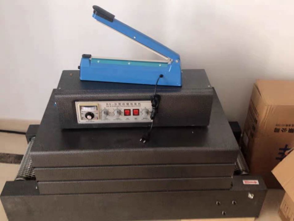 Hot Sale Small Plastic Film Heat Tunnel Shrink Cutting Packaging Machine for Bottle/box Easy Operate